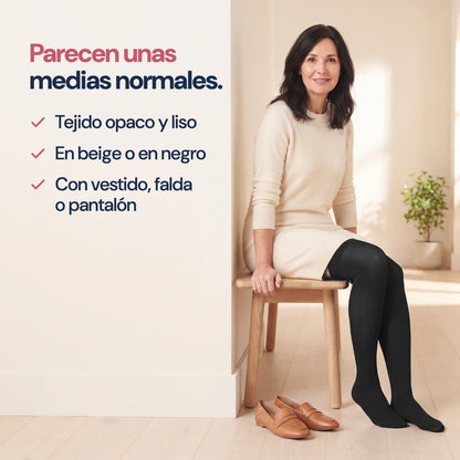 Mujer con vestido y medias de compresión KIMA negras: parecen unas medias normales